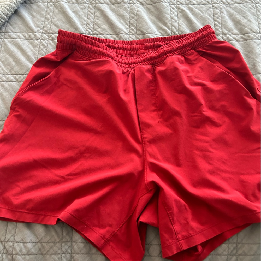 Red lululemon 5 inch pace breaker shorts